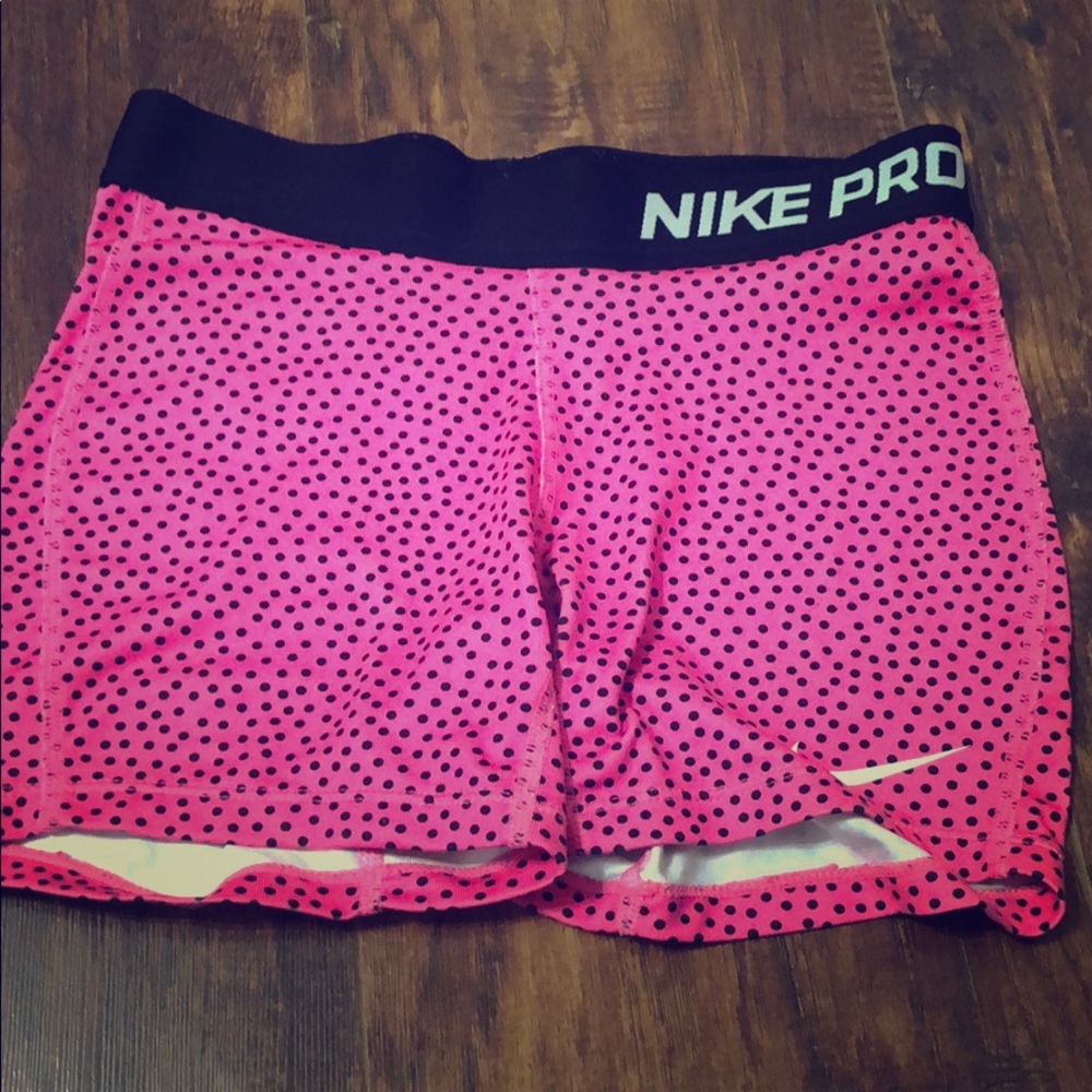 Pink and black polkadotted  Nike Pro shorts